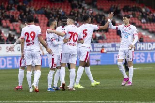Les joueurs du FC Sion s'apprêtent à affronter une série de matches cruciaux dans la course au maintien.